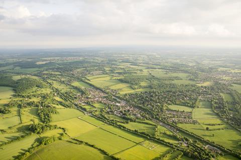 Housing within a greenfield area from above